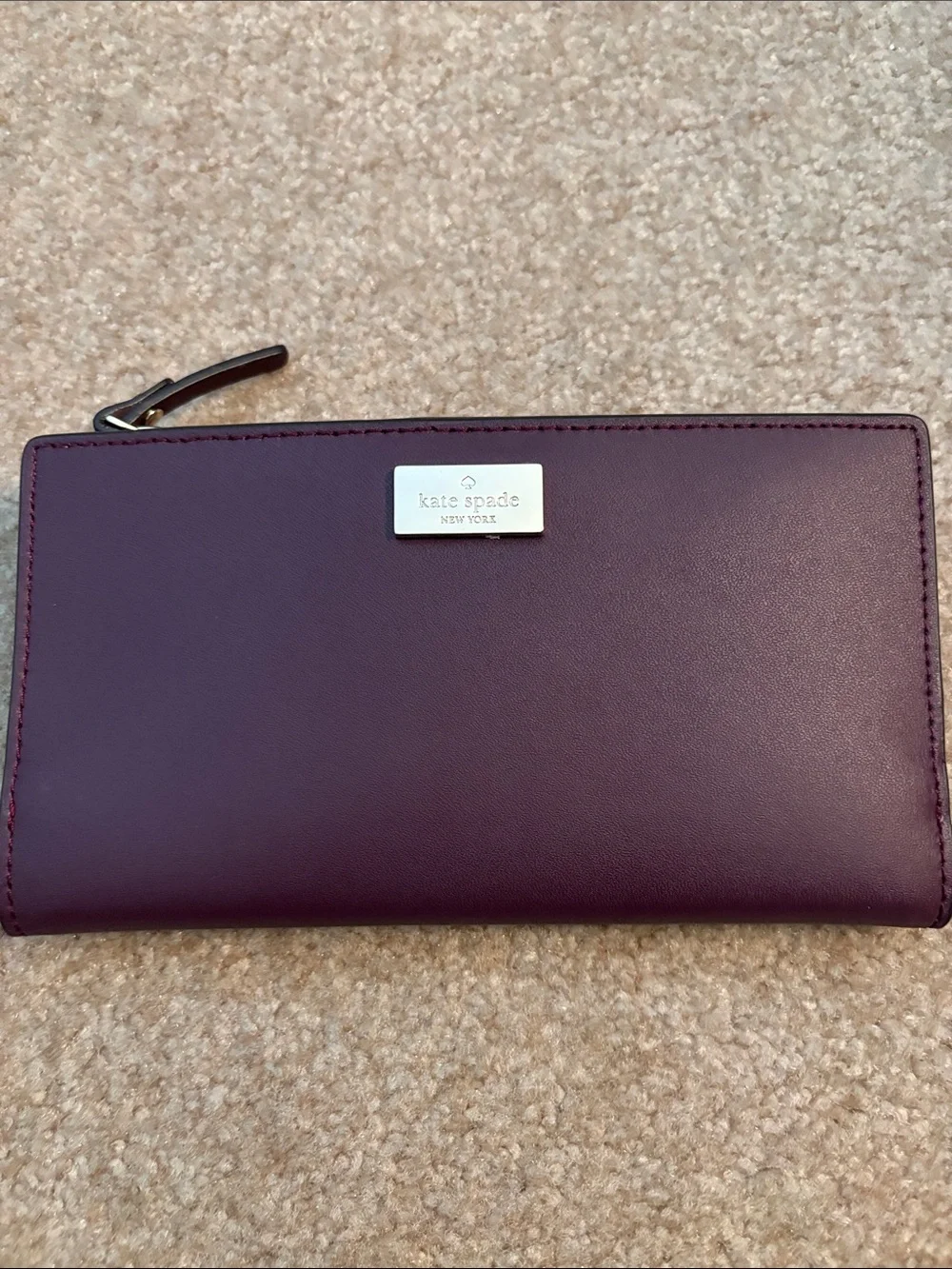 kate spade Plum Zip Leather Wallet with Silver Plaque